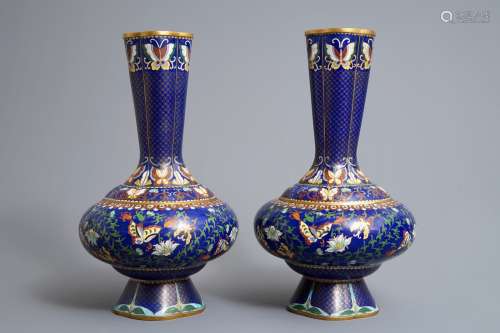A pair of Chinese cloisonné vases with butterflies and flowers, ca. 1900