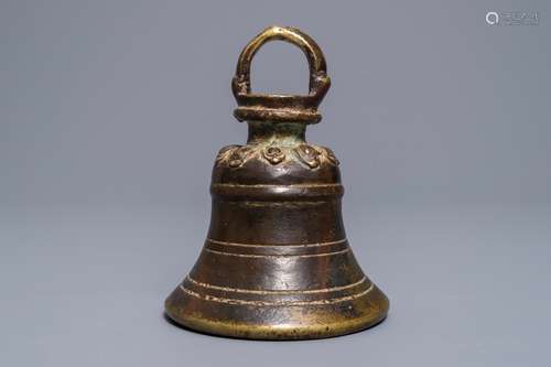 A Sino-Tibetan bronze bell with traces of lacquer and gilding, 17/18th C.