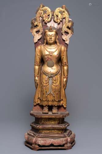 A large Chinese gilt and painted wood figure of Buddha, 19th C.