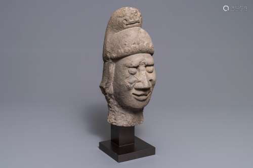 A Chinese carved stone head of a guardian, Ming