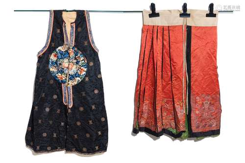 Two Chinese embroidered silk woman’s clothes, 19th C.