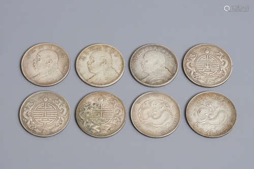 Eight Chinese silver coins, 19/20th C.