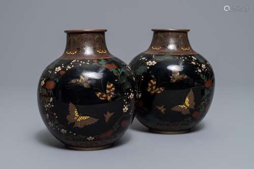 A pair of Japanese cloisonné 'butterfly' vases, Meiji, 19th C.