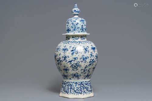 A large Dutch Delft blue and white vase and cover, early 18th C.