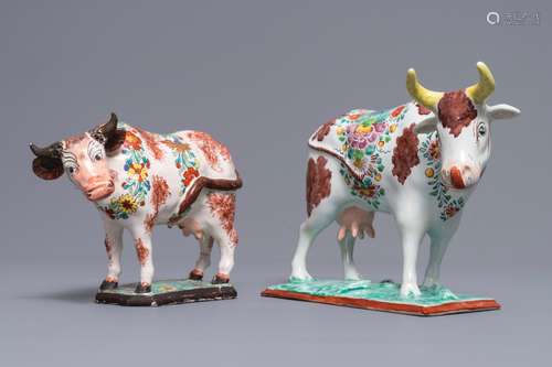 Two polychrome Dutch Delft petit feu cows on bases, 18th C.