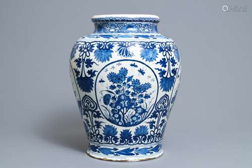 A large Dutch Delft blue and white chinoiserie vase, early 18th C.