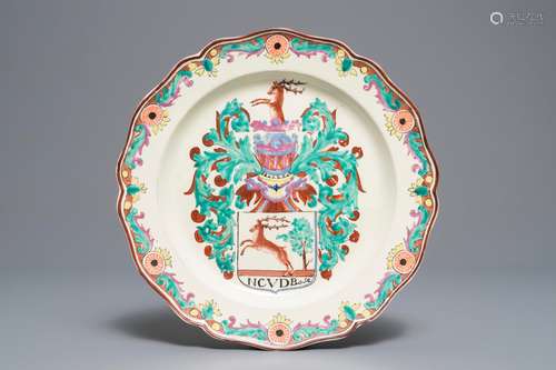 A Dutch-decorated English creamware armorial plate, 18th C.