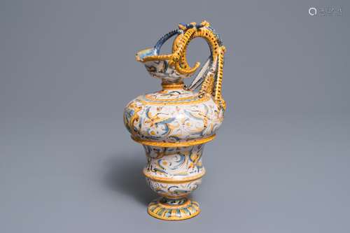 An Italian maiolica jug with grotesques, Caltagirone or Deruta, 17th C.