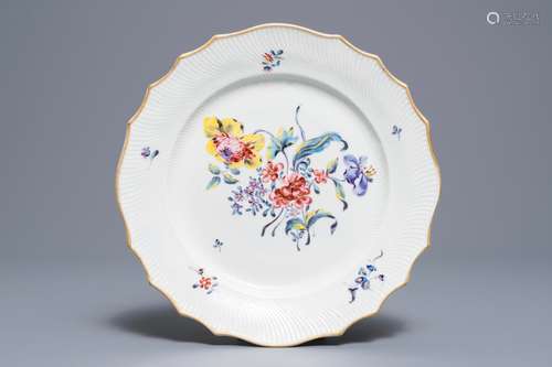 A polychrome Tournai faience 'flower bouquet' plate, 18th C.