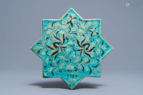 A Lajvardina-glazed star-shaped turquoise ground tile, Kashan, Iran, 13th C.