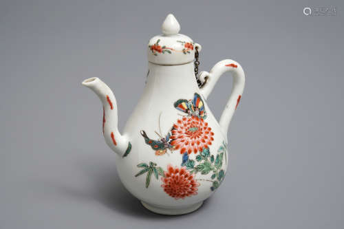 A Chinese famille rose jug and cover with birds and butterflies, Yongzheng mark and of the period