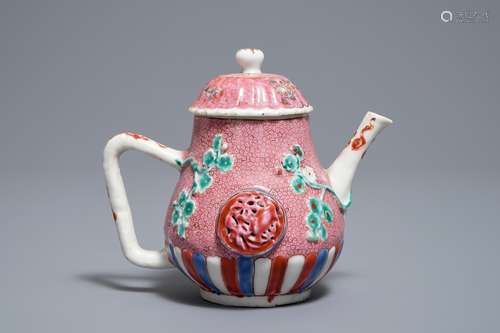 A Chinese famille rose relief-moulded teapot and cover, Yongzheng