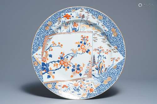 A massive Chinese Imari-style charger with floral and landscape design, Kangxi