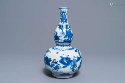 A Chinese blue and white double gourd vase, Transitional period