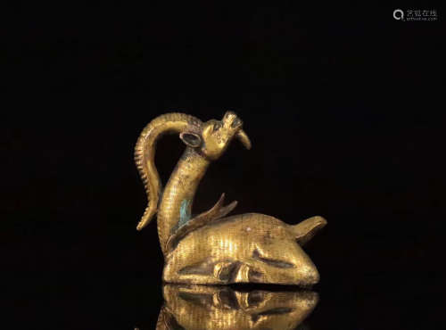 A GILT COPPER SHEEP SHAPED PAPERWEIGHT