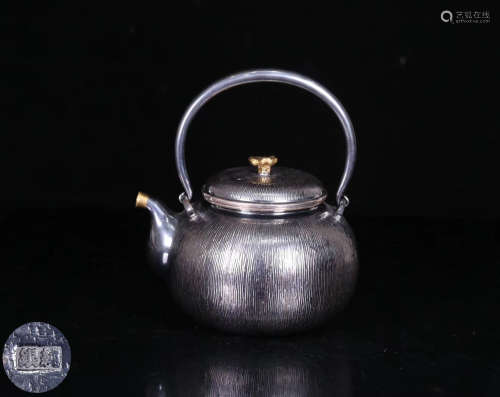 AN OLD SILVER POT