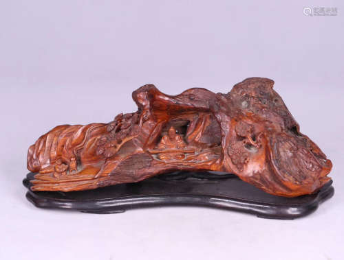 A HUANGHUALI WOOD MOUNTAIN SHAPED ORNAMENT