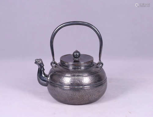 AN OLD SILVER POT