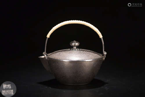 A SILVER CASTED SAND SURFACE TEAPOT