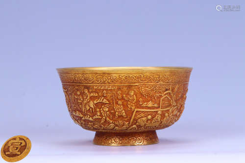 A GILT COPPER CARVED CHARACTER PATTERN BOWL