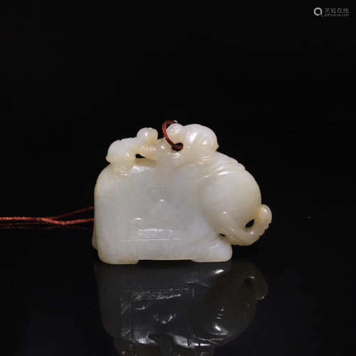 A JADE CARVED CHARACTER STORY PENDANT
