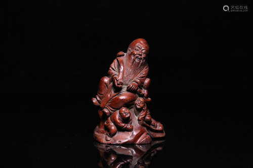 A BAMBOO CARVED CHARACTER PENDANT