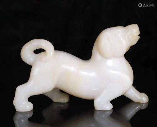 A HETIAN JADE CARVED DOG SHAPED FIGURE