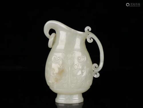 A HETIAN JADE CARVED BEAST PATTERN CUP