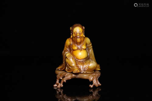 A SOAPSTONE CARVED CHARACTER BUDDHA