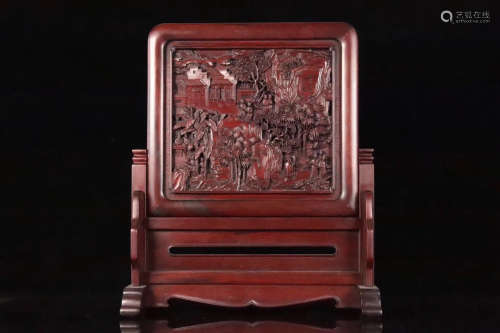 A RED WOOD CARVED LANDSCAPE PATTERN SCREEN
