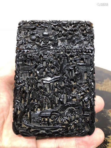 A TORTISESHELL CARVED CHARACTER PATTERN BOX