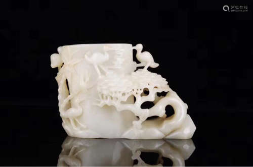 A HETIAN JADE CARVED BIRD AND LANDSCAPE SHAPED ORNAMENT