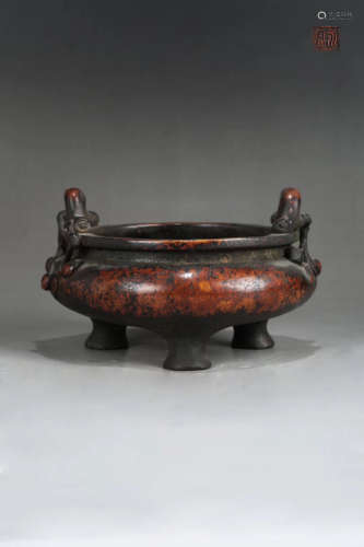 A BRONZE CARVED TREE SHAPED EAR CENSER