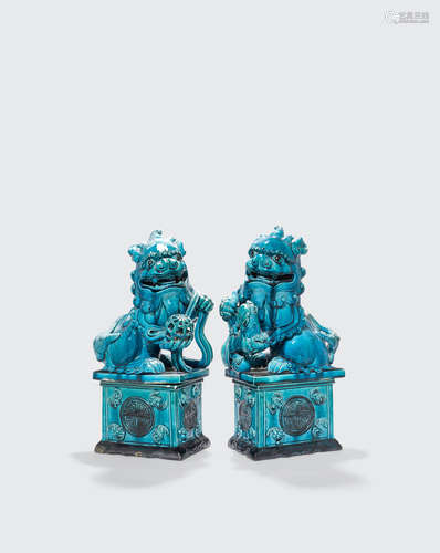 Qing dynasty a pair of turquoise glazed fu-lions and stands