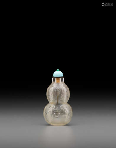 Probably Imperial, attributed to the Beijing Palace Workshops, 18th/early 19th century An 'auspicious' rock crystal 'double-gourd' snuff bottle