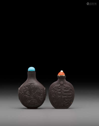 Inscribed bottle: late 18th/19th century Two carved duan stone 'dragon' snuff bottles