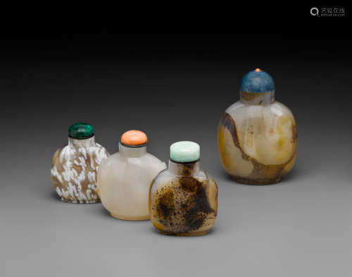 Late 19th/20th century Three agate snuff bottles and an agate cabinet bottle