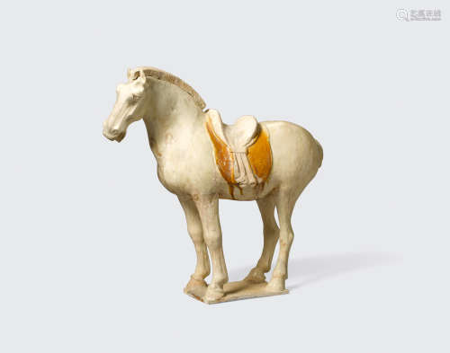 Tang dynasty A straw and chestnut glazed pottery figure of a horse