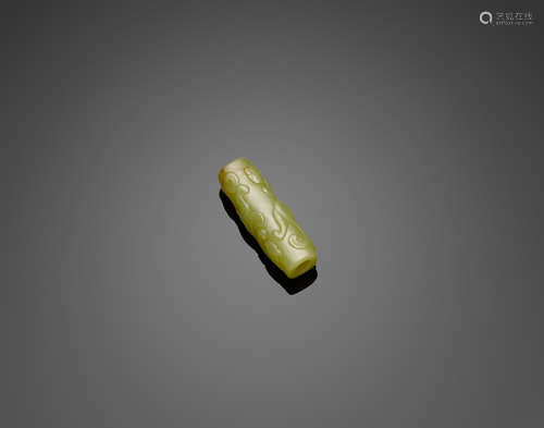 A YELLOW JADE ARCHAISTIC 'CHILONG' BEAD