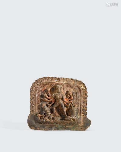 Nepal, circa 13th century A copper repoussé plaque of Durga Mahishasura Mardini