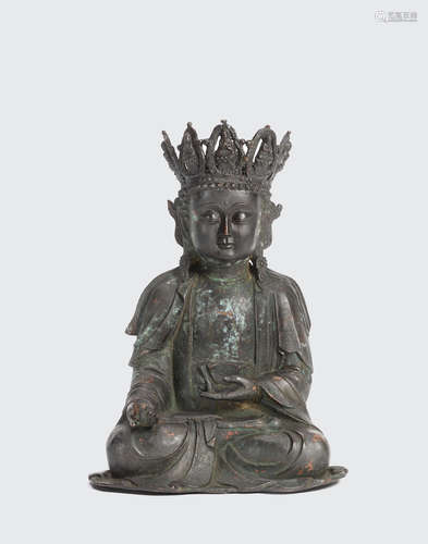 Ming dynasty A gilt-lacquered bronze seated Buddhist figure