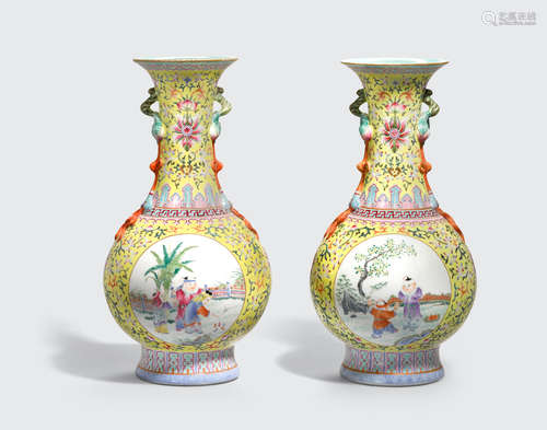 Qianlong marks, Republic period A pair of famille jaune vases with peach branch handles