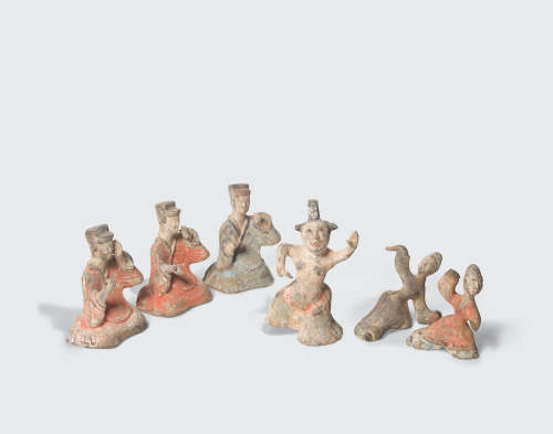 Han dynasty A GROUP OF SIX PAINTED POTTERY ENTERTAINERS