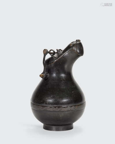 17th century or earlier An unusual silver inlaid bronze archaistic pitcher