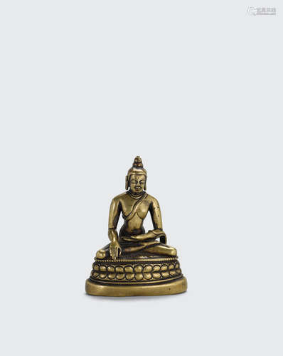 Northeastern India or Tibet, Pala Style, circa 12th century A BRASS ALLOY FIGURE OF BUDDHA