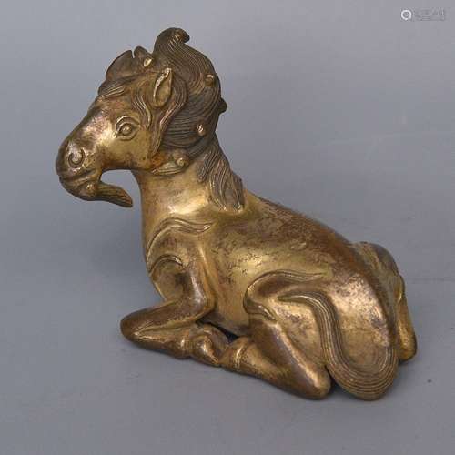 A GILT-BRONZE PAPER WEIGHT