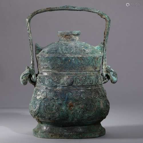 A CHINESE ARCHAITIC BRONZE VESSEL, 'YOU'