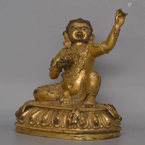 A GILT-BRONZE FIGURE OF BUDDHA