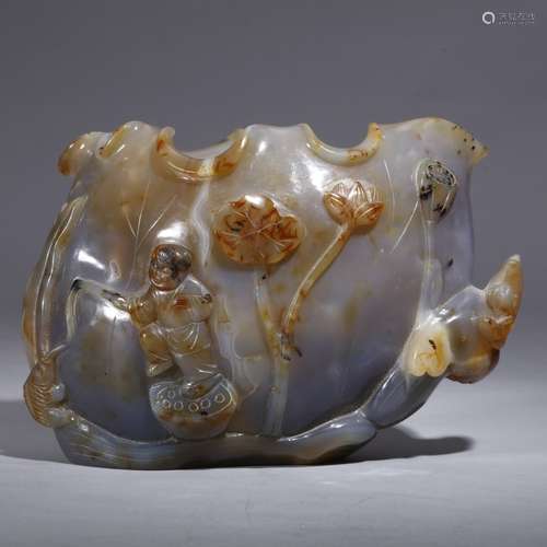 A CHINESE ARCHAIC CARVED AGATE CUP