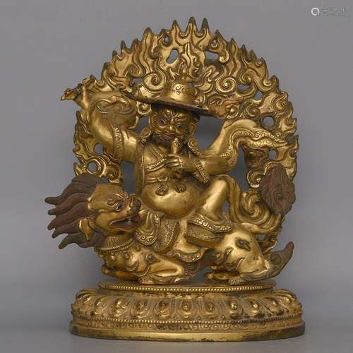 A GILT-BRONZE FIGURE OF MAHAKALA